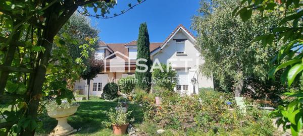 Maison familiale sur un très beau jardin arboré