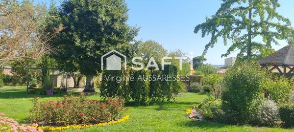 Maison familiale sur un très beau jardin arboré