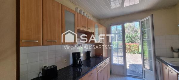 Maison familiale sur un très beau jardin arboré