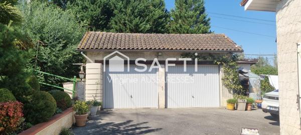 Maison familiale sur un très beau jardin arboré