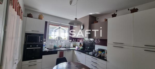 Maison familiale sur un très beau jardin arboré