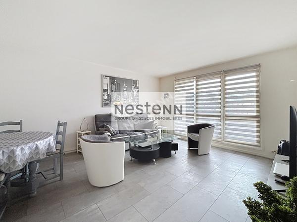 Appartement 2 pièces - 52 m² - balcon -parking sous-sol - cave - ascenseur.