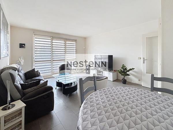 Appartement 2 pièces - 52 m² - balcon -parking sous-sol - cave - ascenseur.