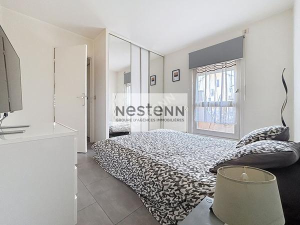 Appartement 2 pièces - 52 m² - balcon -parking sous-sol - cave - ascenseur.