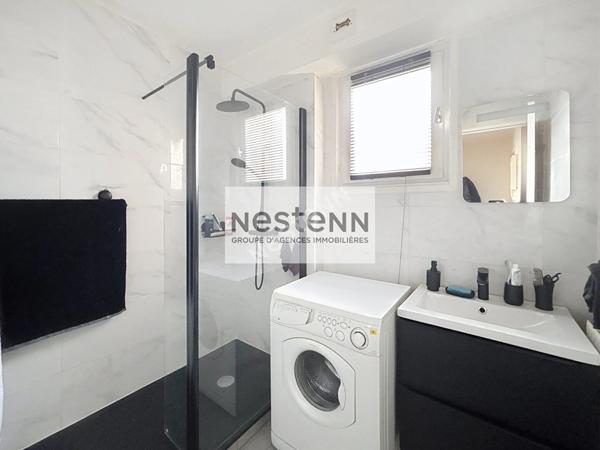 Appartement 2 pièces - 52 m² - balcon -parking sous-sol - cave - ascenseur.