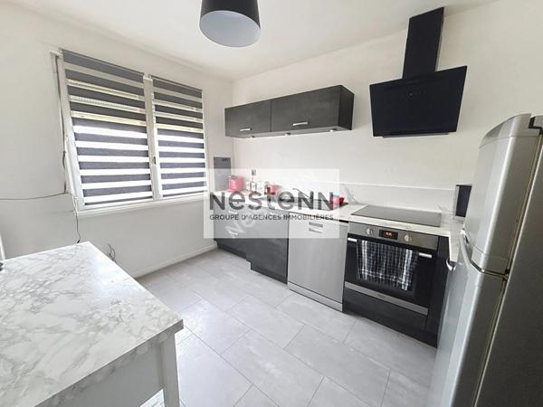 Appartement 2 pièces - 52 m² - balcon -parking sous-sol - cave - ascenseur.