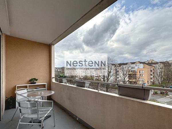 Appartement 2 pièces - 52 m² - balcon -parking sous-sol - cave - ascenseur.