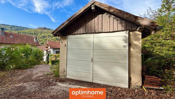Maison mitoyenne en pierre – potentiel 2 logements – 4 chambres – jardin – petit garage
