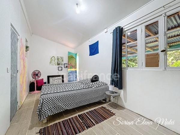 Maison avec piscine au cœur d’un écrin tropical - 5 pièces PETIT BOURG (971)