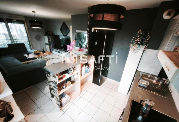 Calme, sécurité et confort dans une résidence récente avec balcon, parking et cave