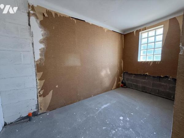 BOUGUENAIS GAUDINIERE - Appartement T2 avec balcon, jardin et parking à aménager