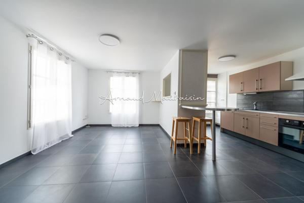 Duplex sans travaux avec 2 places de stationnement