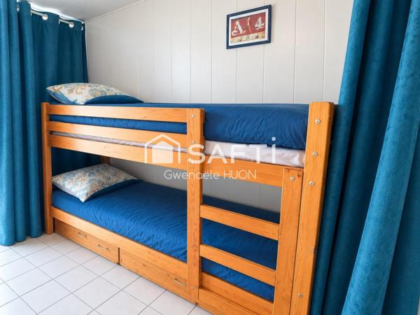 À 200 m de la plage, studio en rez de jardin exposé SO