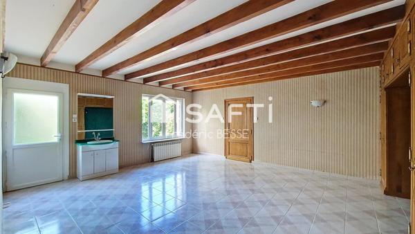 Maison T9 270m² avec garage, dépendance et parc arboré.