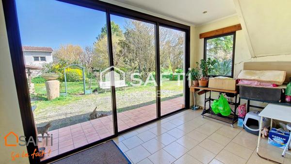 Maison T9 270m² avec garage, dépendance et parc arboré.