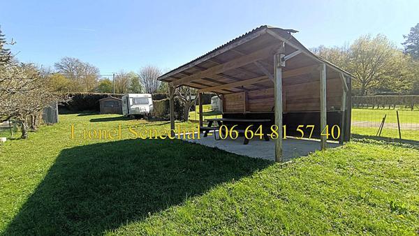Terrain de loisirs de plus de 600 m2 au bord de la rivière à Neuville - sur - Sarthe