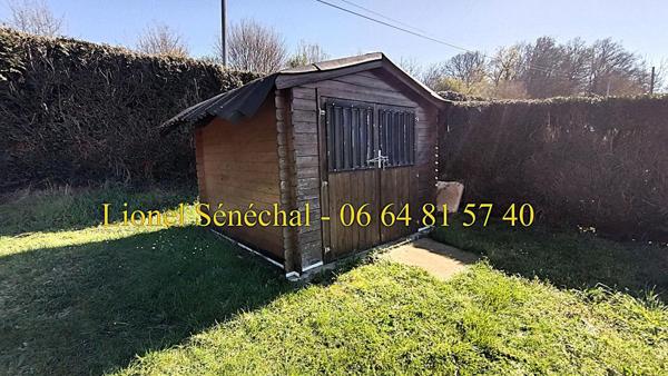 Terrain de loisirs de plus de 600 m2 au bord de la rivière à Neuville - sur - Sarthe