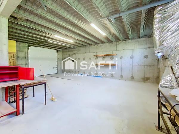 Maison 4 pièces 96 m2 et 157 m2 de garage, idéale pour une activité artisanale