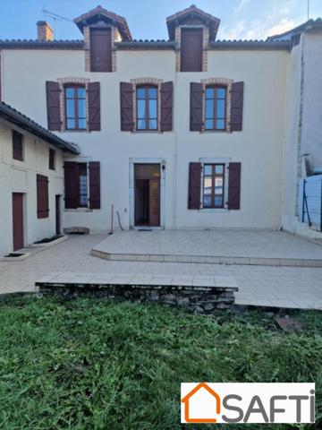 Jolie maison en pierre au centre ville de Septfonds.