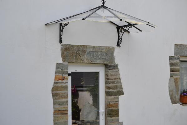 Guimaëc (29620) Guimaec bourg, maison en pierre de 1848 entièrement rénovée avec jardin et garage, 4 chambres.