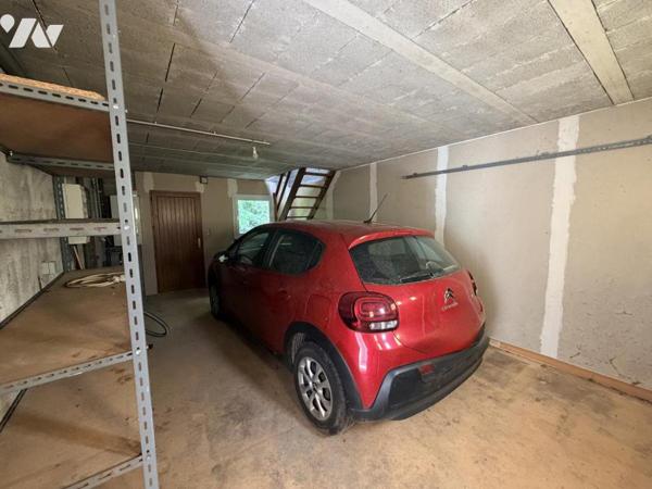 Maison d'habitation construite sur 2 niveaux  4 chambres et 1 garage