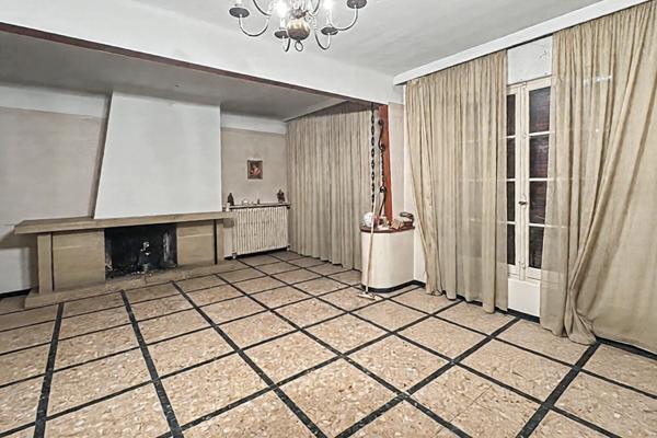 Maison de 217 m² à vendre en coeur de ville avec 2 appartements indépendants, terrain de 575 m² et fort potentiel d'aménagement