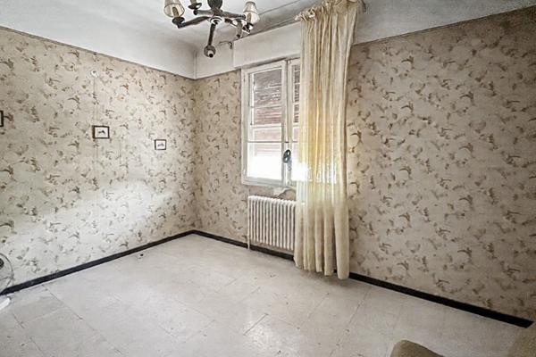 Maison de 217 m² à vendre en coeur de ville avec 2 appartements indépendants, terrain de 575 m² et fort potentiel d'aménagement