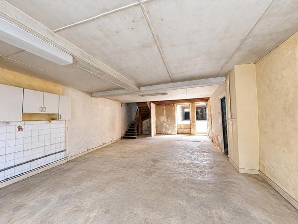 Maison avec un beau potentiel de rénovation au cœur du centre-ville !