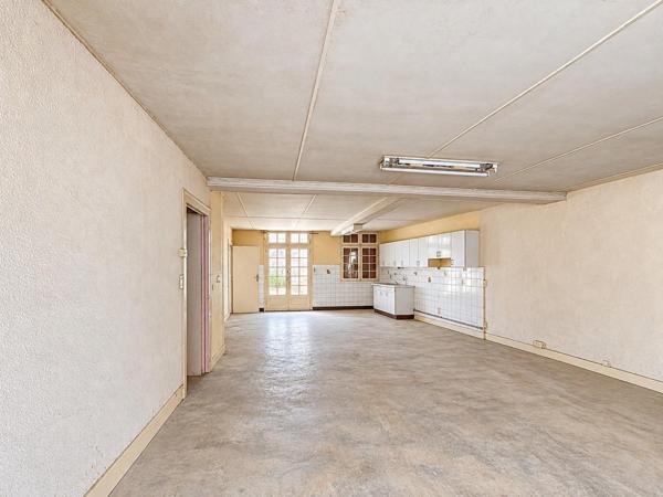 Maison avec un beau potentiel de rénovation au cœur du centre-ville !