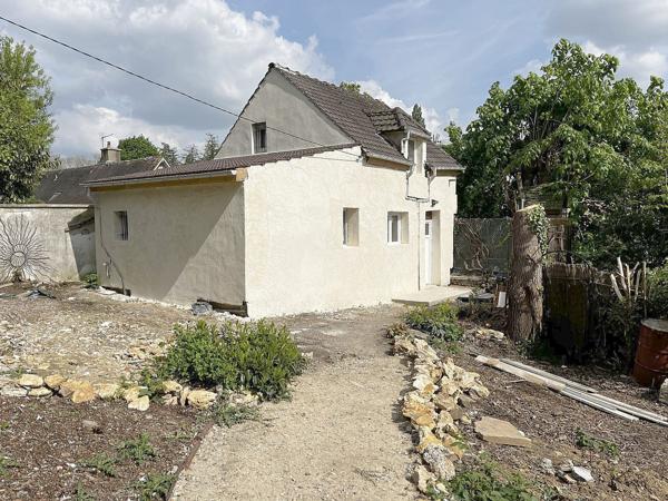 Petite maison rénovée sur grand terrain boisé