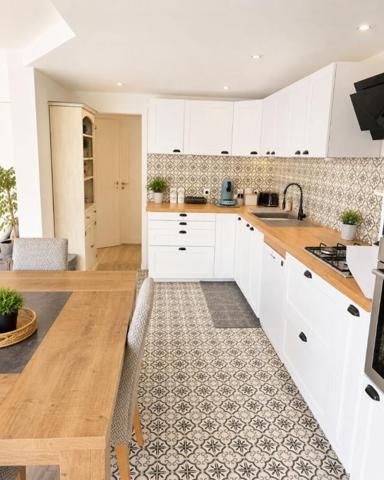 Maison  4 pièce(s) 90 m2 avec extérieur et panneaux solaires