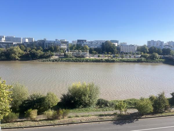 Appartement Nantes Mangin T6 avec loggia vue Loire, 4 chambres et 2 places de parking 499 900 € FAI 3560ND – nantes Sud Immobilier
