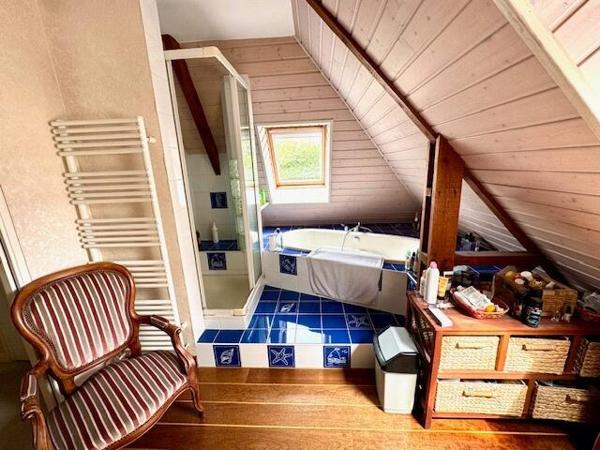 Très belle propriété sur un parc paysagé clos de 2354 m2