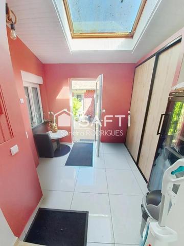 Maison Individuelle 8 piéces de Style "Art Déco"  au centre de Tergnier, vivable de plain pied.