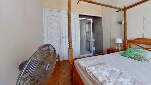 Maison de plain-pied - 4 chambres - garage - terrain clos