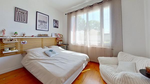 Maison de plain-pied - 4 chambres - garage - terrain clos