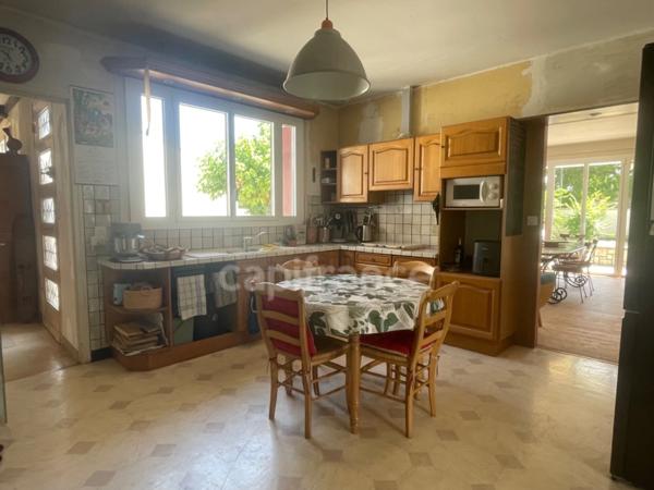 Maison de plain-pied - 4 chambres - garage - terrain clos
