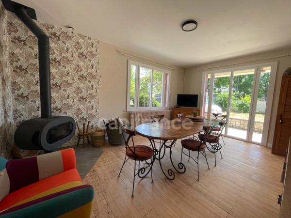 Maison de plain-pied - 4 chambres - garage - terrain clos