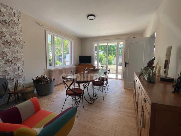 Maison de plain-pied - 4 chambres - garage - terrain clos