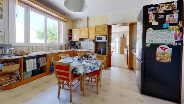Maison de plain-pied - 4 chambres - garage - terrain clos