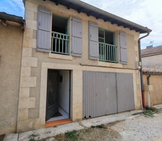 Immeuble de rapport avec T2 loué, T4 libre et garage à Pavie. Idéal investisseur.