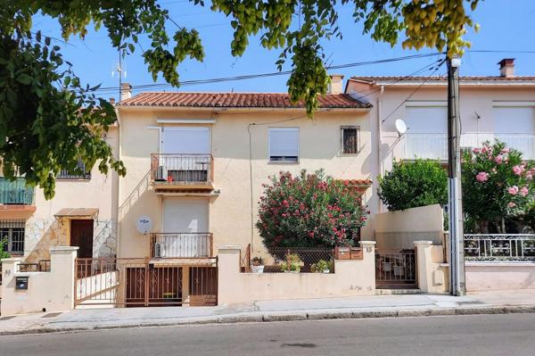 Appartement T3 avec cours privée, cave et garage