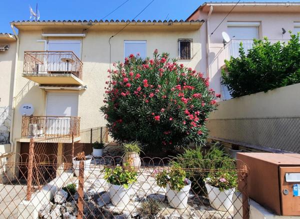 Appartement T3 avec cours privée, cave et garage