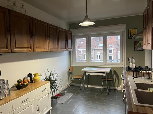Appartement T4 avec parking collectif