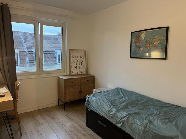Appartement T4 avec parking collectif