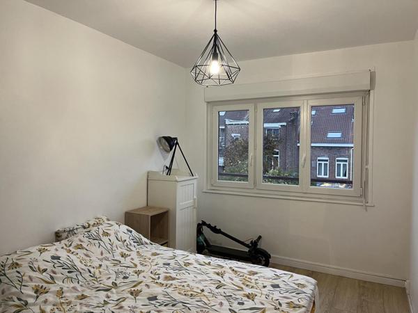 Appartement T4 avec parking collectif
