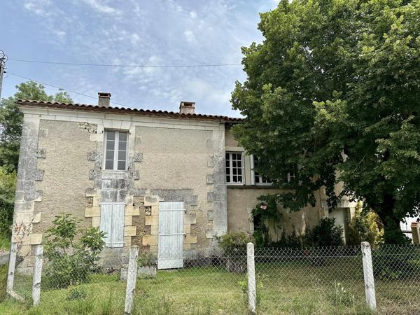 Maison de caractère en pierre avec grange et jardin