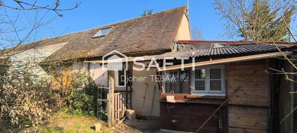 Maison ancienne avec terrain et garage