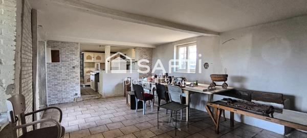 Maison ancienne avec terrain et garage