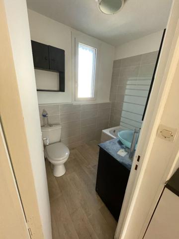 Centre de BOURG ACHARD - Appartement 2 pièces et 1 bureau de 49 m2